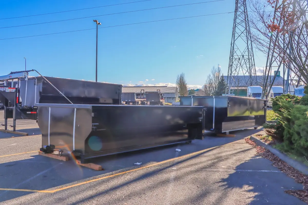 Roll-off dumpster ready for waste disposal at job site for Yard Waste Dumpster Rental in Island Park
